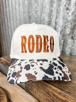 Rodeo Embroidered Hat + Cow Print Brim