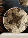 Baskets made of seagrass
Large basket measures 24"
Small basket measures 18 3/4"
Wall Decor