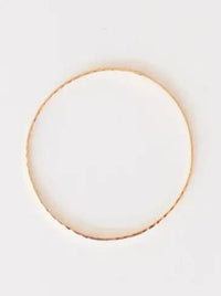 Eloise Hammered Bangle 7 1/4" Plated 18K Gold - Allure Boutique WY